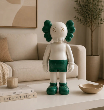 White and green KAWS Companion figure on a coffee table in a living room